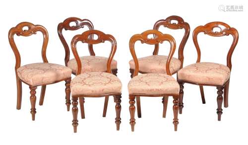 A set of twelve Victorian mahogany dining chairs