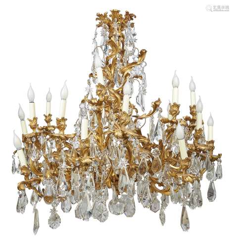 A substantial French gilt bronze and cut glass twenty-four light chandelier in Louis XV style