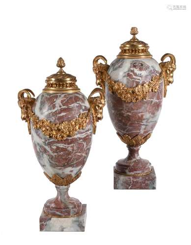 A pair of French Brocatelle marble and gilt metal mounted urns in Louis XVI style