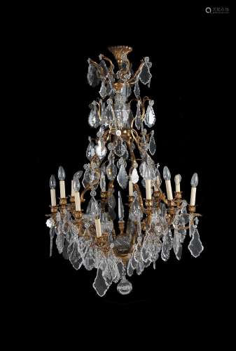 A cut and moulded glass and gilt metal sixteen-light chandelier in Louis XV style