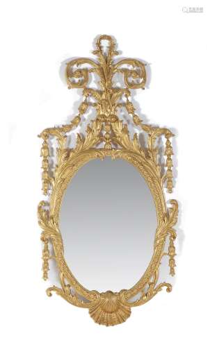 A pair of carved and gilded mirrors in the mid-18th century style