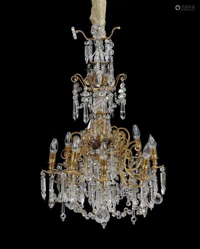 A gilt metal and cut glass eight branch chandelier in Louis XV style 19th century