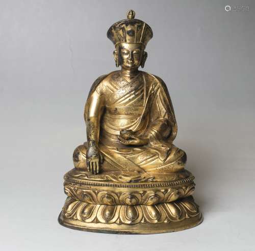 A Bronze Figure Of Buddha