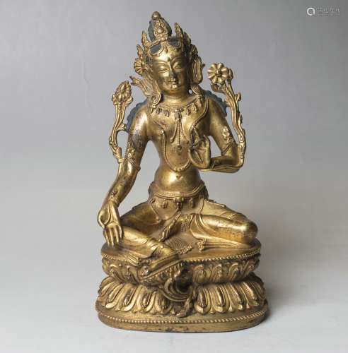 A Bronze Figure Of Guanyin