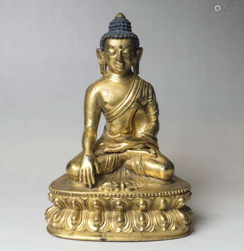 A Bronze Figure Of Buddha