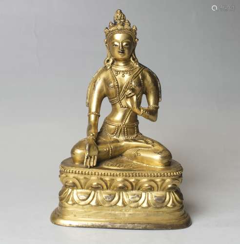 A Bronze Figure Of Buddha