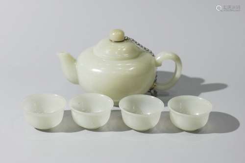 A Set Of Carved Jade Pot And Cups