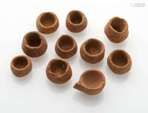 Set of ten terracotta digging ointment vases. High…