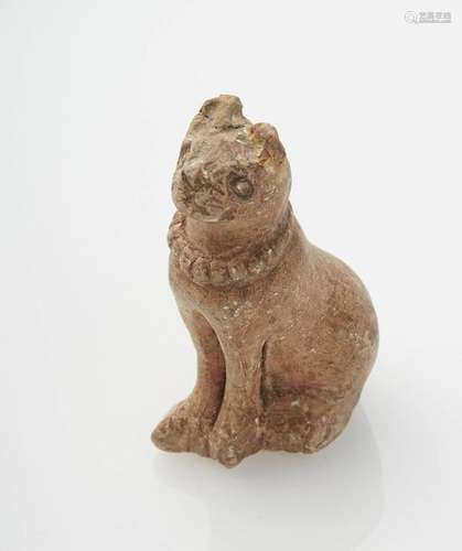 Statuette representing a seated cat. It is made of…