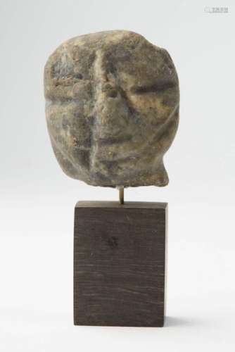 Head from a hard stone statuette. Mexico, Teotihua…