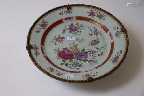 China. Round porcelain plate with polychrome and g…