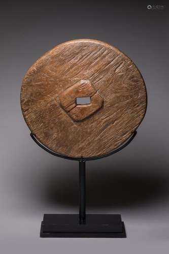 INDONESIA. nOld and thick wooden cartwheel with ve…