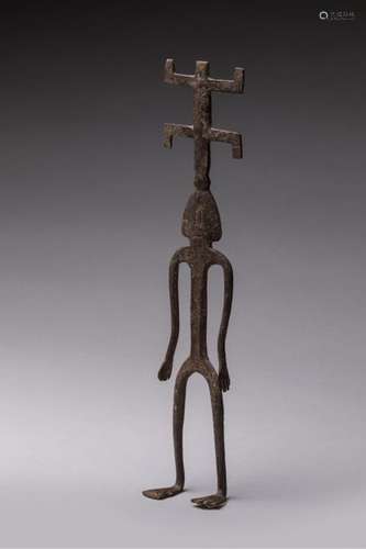 DOGON, Mali. nStylized character standing in iron.…