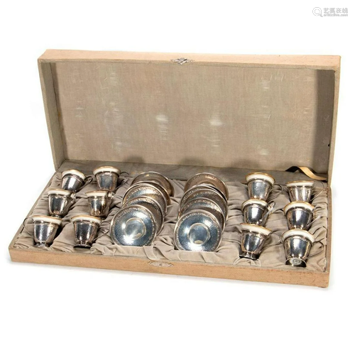 Cased sterling silver demi-tasse set