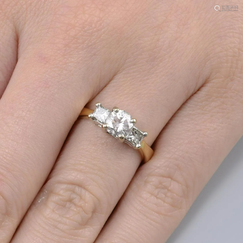 A brilliant and square-shape diamond three-stone