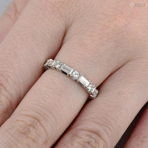 An alternating brilliant and baguette-cut diamond full