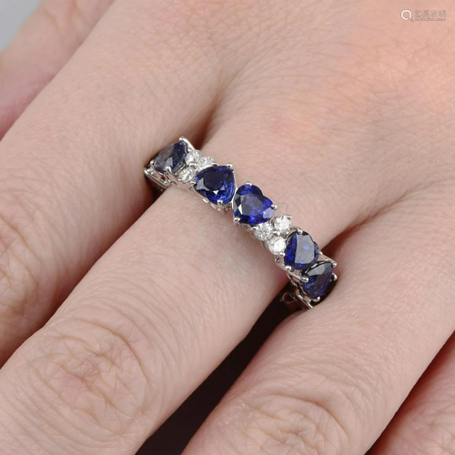 An 18ct gold heart-shape sapphire and brilliant-cut