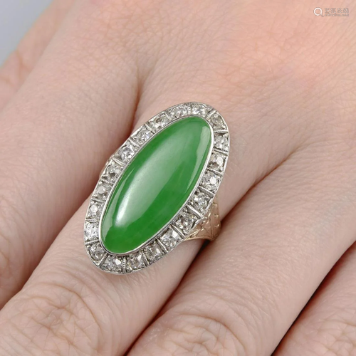 A jade and diamond cluster ring.With report 7921…