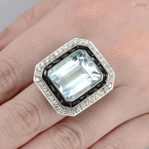 An aquamarine, onyx and brilliant-cut diamond