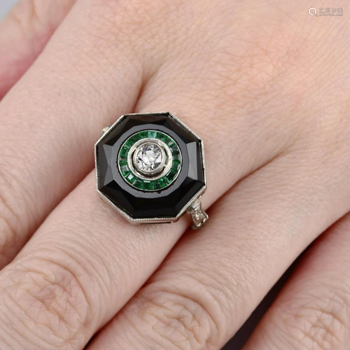 An old-cut diamond, calibre-cut emerald and onyx