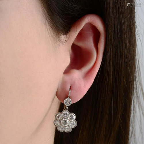 A pair of brilliant-cut diamond floral cluster