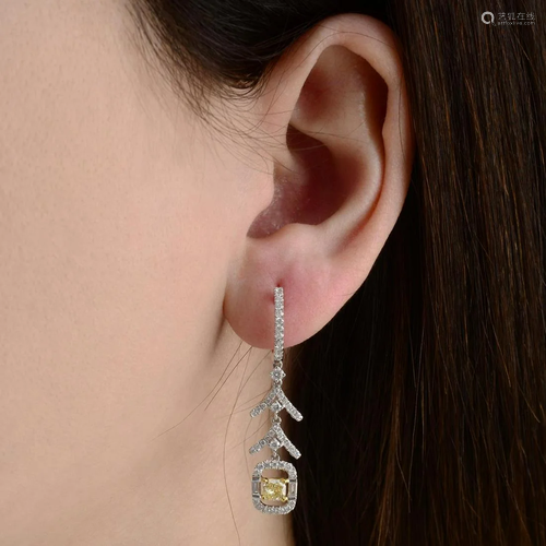 A pair of 'Yellow' diamond and diamond earrin…