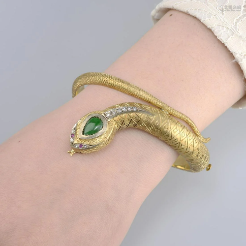 A hinged serpent bangle, set with jade and si…