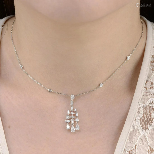 A vari-cut diamond pendant necklace.Total diamond