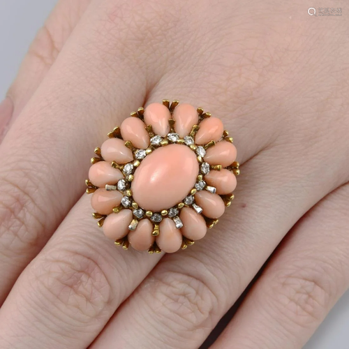 A coral and diamond cluster ring.Estimated total