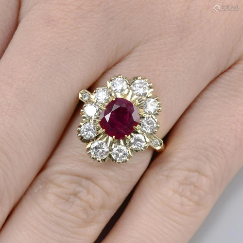 A ruby and brilliant-cut diamond cluster ring. Ruby