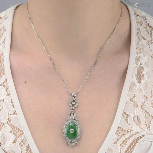 A jade and diamond pendant, on chain. Signed V…