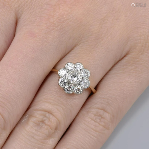 An old-cut diamond floral cluster ring. Estimated …