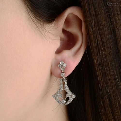 A pair of vari-cut diamond earrings.Estimated t…