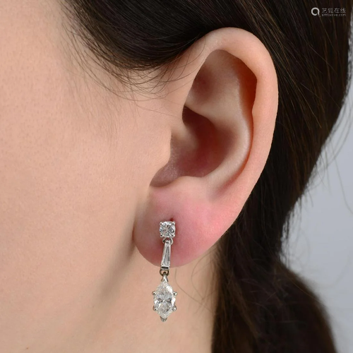 A pair of vari-cut diamond drop earrings.Estima…