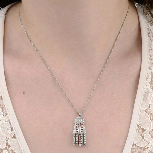 A brilliant-cut diamond tassel pendant, with integral