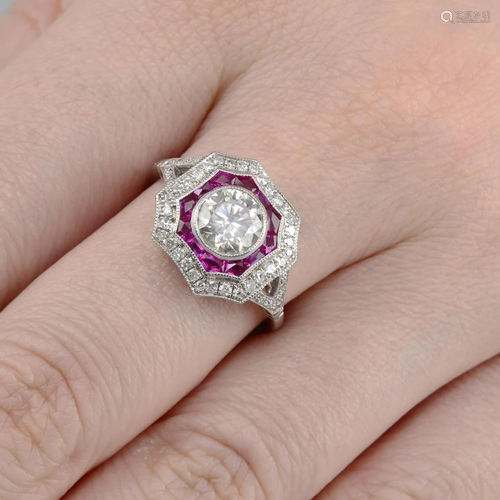 A brilliant-cut diamond and ruby dress ring.Principal