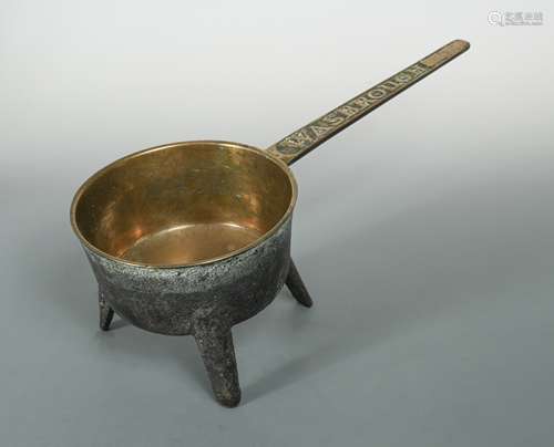 An 18th century bronze metal skillet,