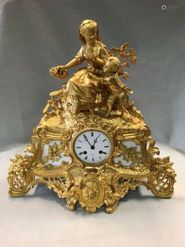 A French gilt metal mantel clock, late 19th century,