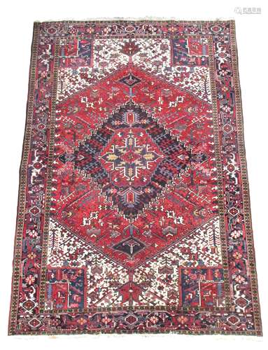 A Heriz carpet,