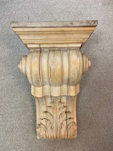 A carved limewood corbel bracket, probably late 19th century,