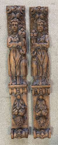 A large pair of carved oak caryatids, probably late 17th or early 18th century,