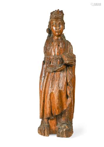 A carved limewood saint, 17th century