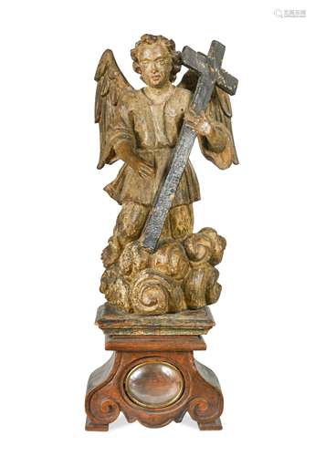 A Spanish carved wood figure of St Michael, 17th century,