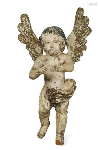 A carved painted wood cherub, 19th century,