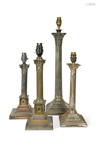 Four assorted electroplate Corinthian column table lamps,