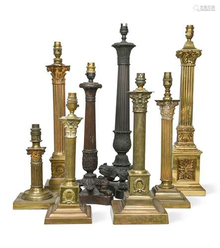 Six assorted brass columnar table lamps,