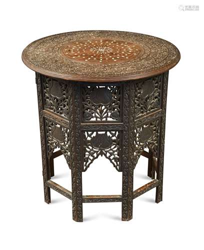 An Eastern circular occasional table,