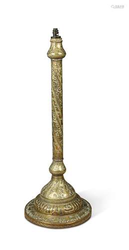 An Eastern brass standard lamp,