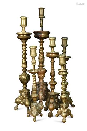 Six various 18th and 19th century bronze candlesticks,