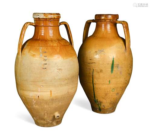 A near pair of large twin-handled ovoid Mediterranean olive jars,